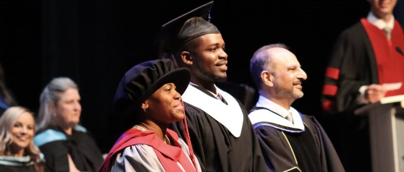 President Jay notay, VP Sandra Efu and a graduate all in robes at Convocation