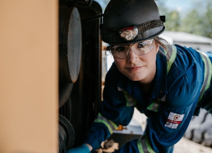 student working on equipment