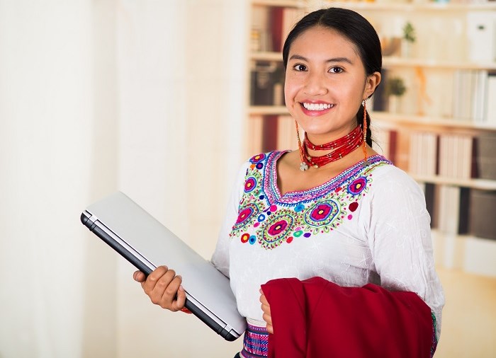 Woman holding a computer