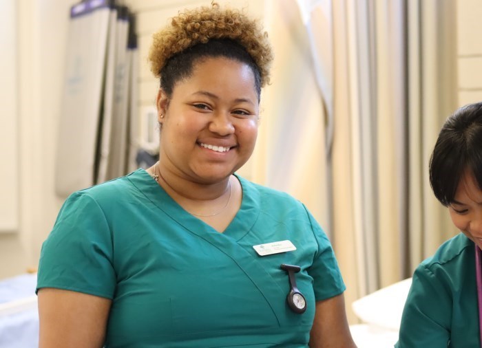 health care worker smiling at camera