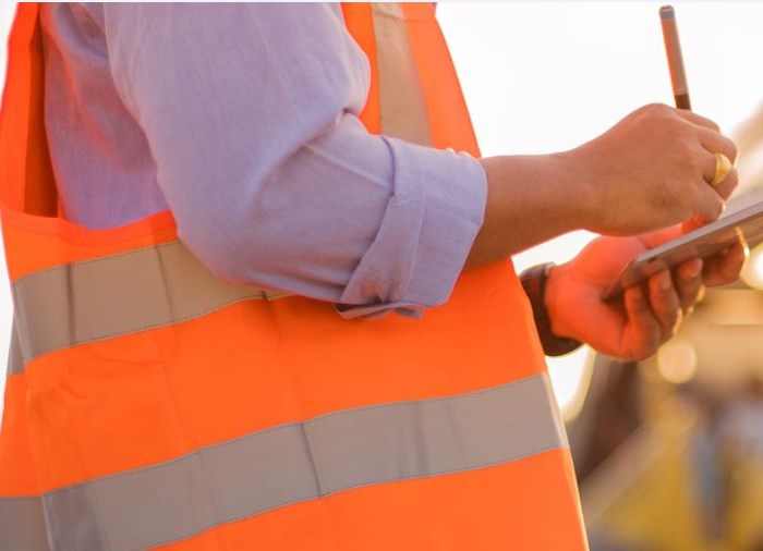 person wearing a safety vest