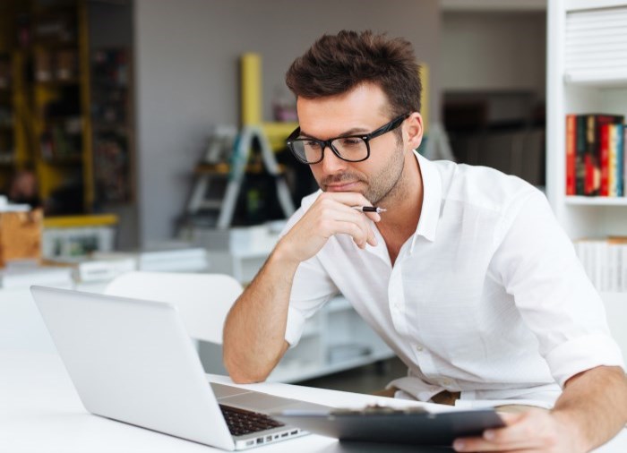 man on computer