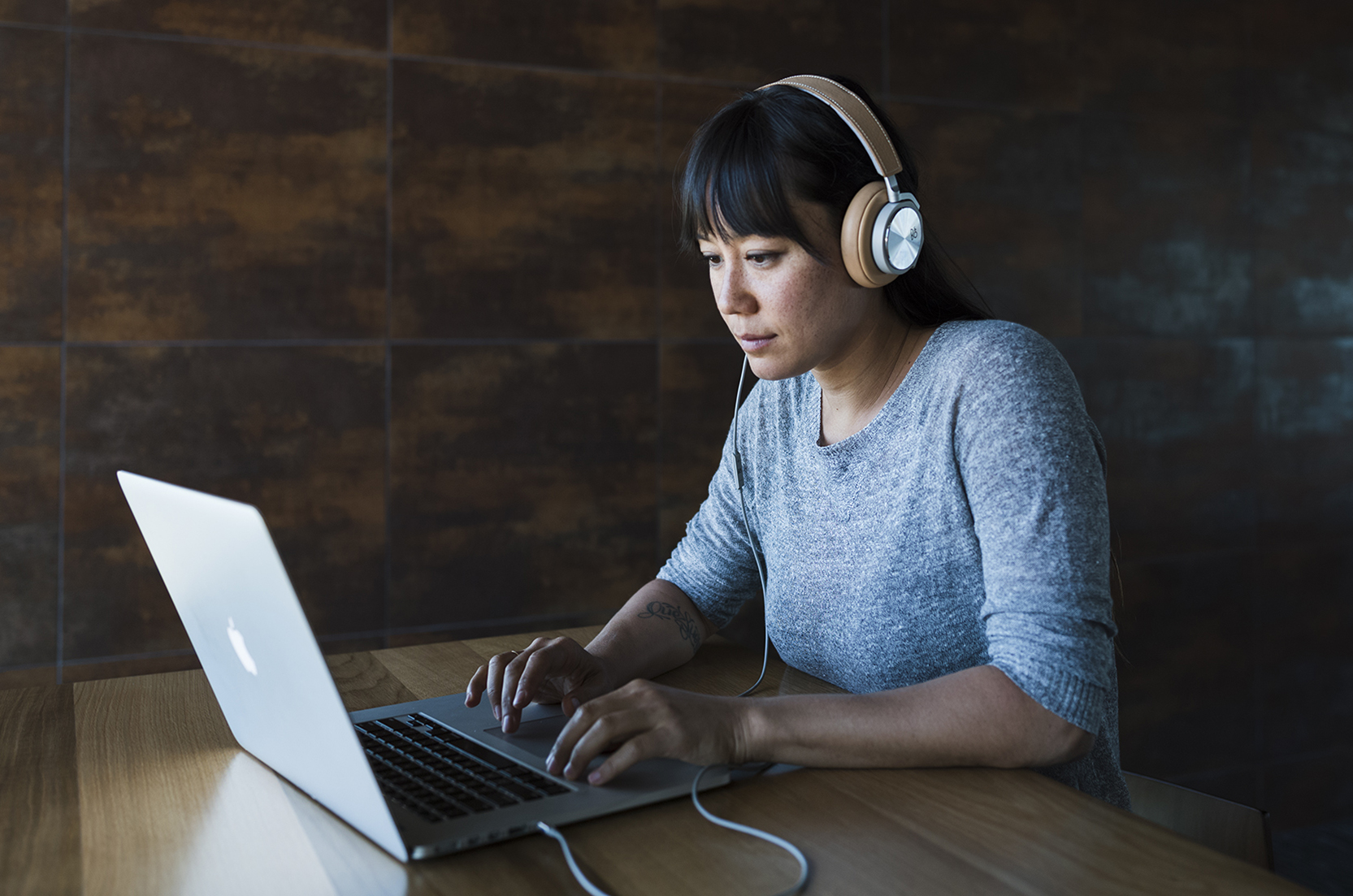 woman typing on computer