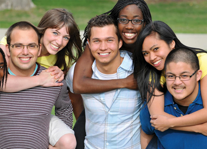 students smiling at camera