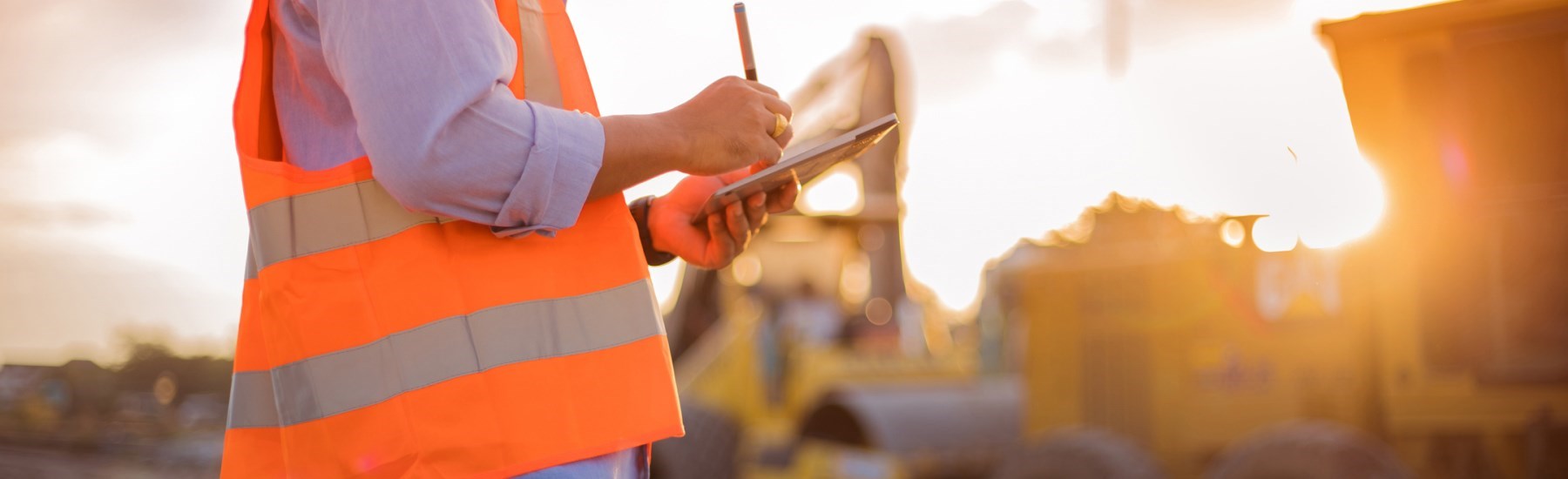 construction manager reviews site