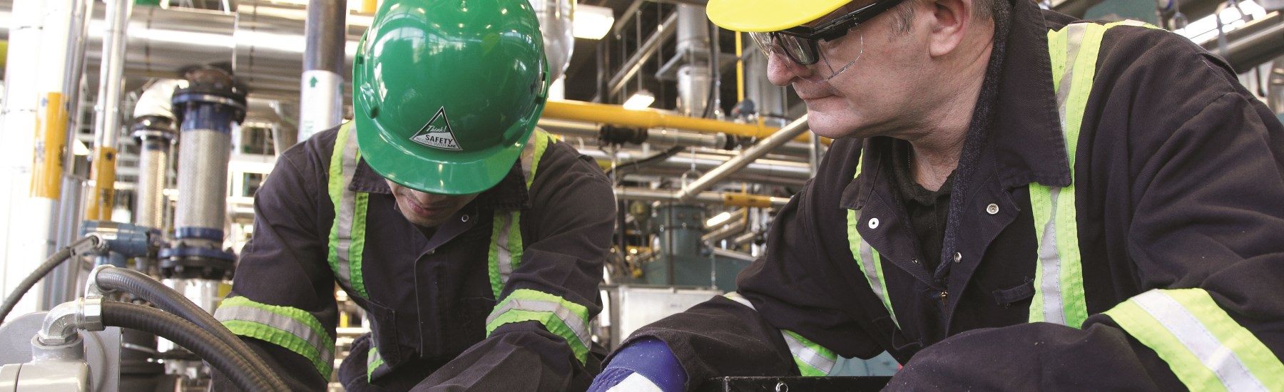 men working on pipes