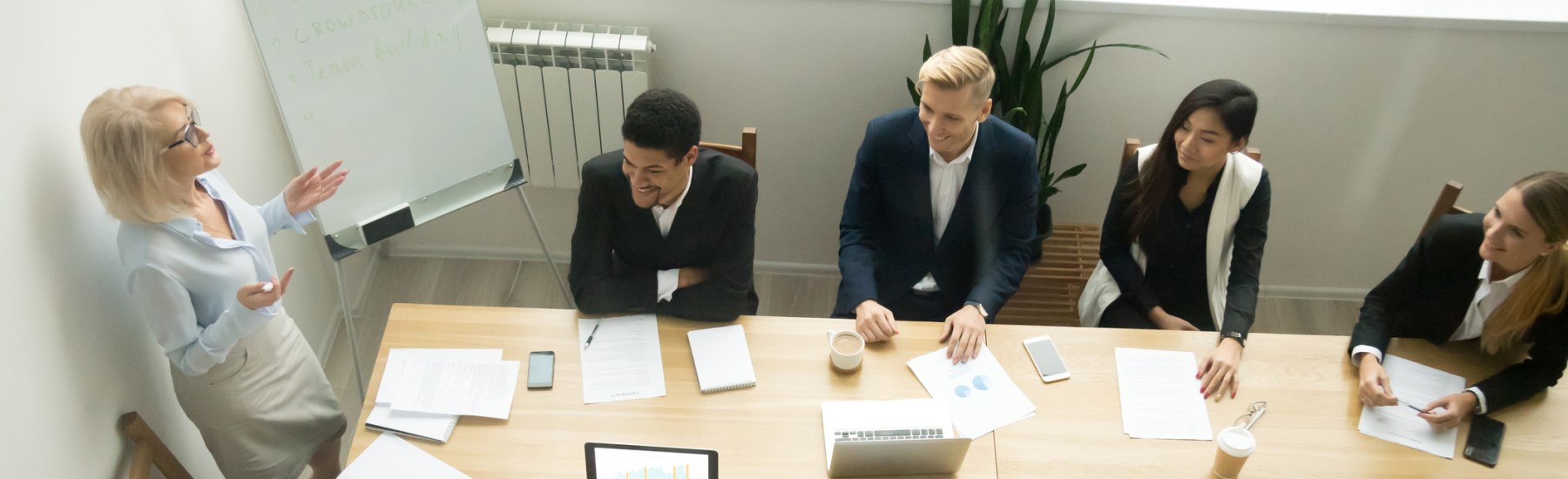 People learning around a table