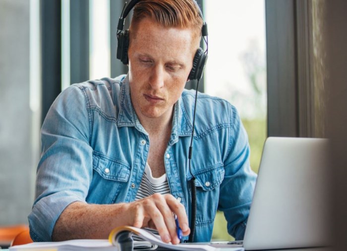 Guy working on computer
