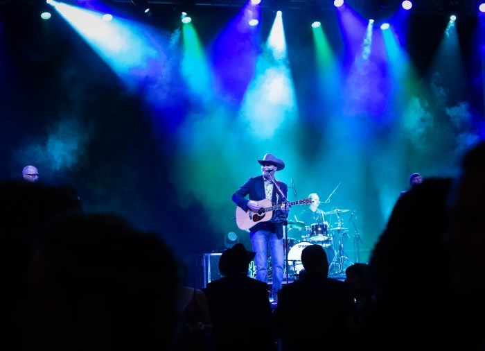 country singer on stage at gala event