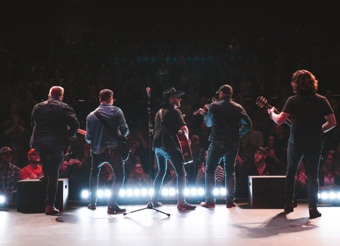 musicians on stage facing audience