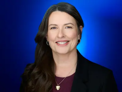A headshot of Pam Mcpherson