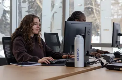 Two students using computers